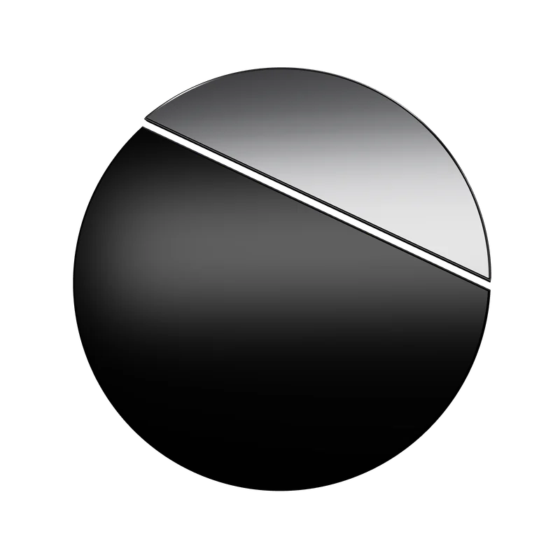 The Aperture object face-on: a black ceramic disc with a platinum segment.